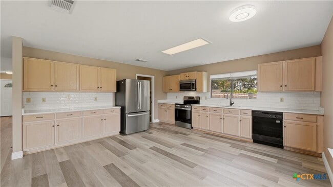 Building Photo - 7338 Raintree Forest
