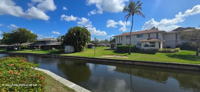Building Photo - Welcome to **Caloosa Yacht & Racquet Club**, one of Fort Myers’ most charming **gated waterfront ...