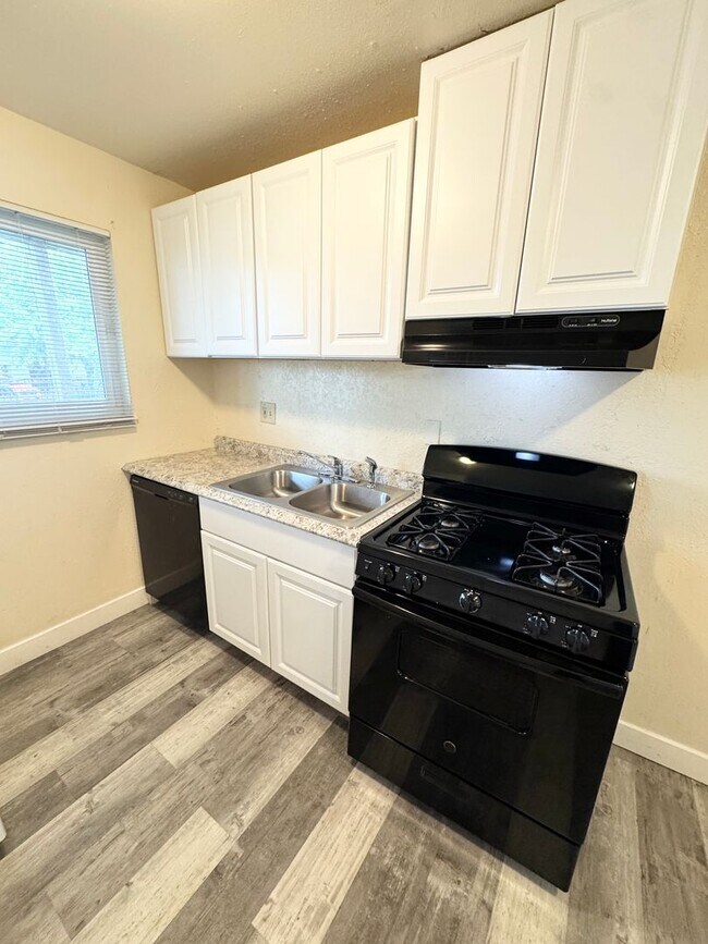 Building Photo - Move-In Special; Downstairs One Bedroom + Private Patio – Available Now! SEE VIDEO