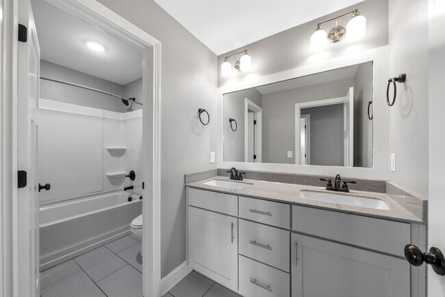 Building Photo - Elegant 4-Bedroom Home with Vaulted Ceilin...