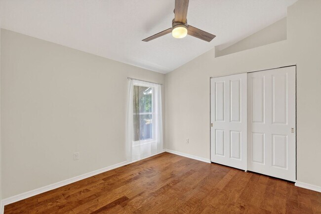 Building Photo - Available Now! Waterfront Living at Its Best – Pool, Decks & Gated Privacy