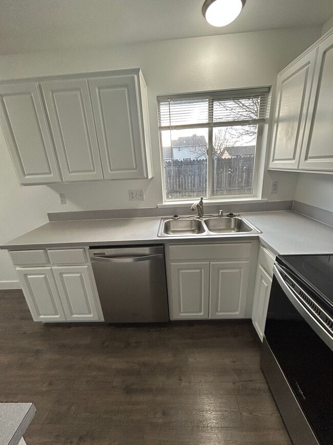 Building Photo - Beautifully Remodeled 2 Bedroom 1 Bath Duplex w/ Large Yard!! Pets are welcome! Electric car char...