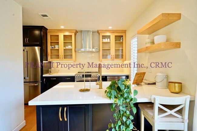 Building Photo - Stunning Remodeled Condo with Designer Fin...