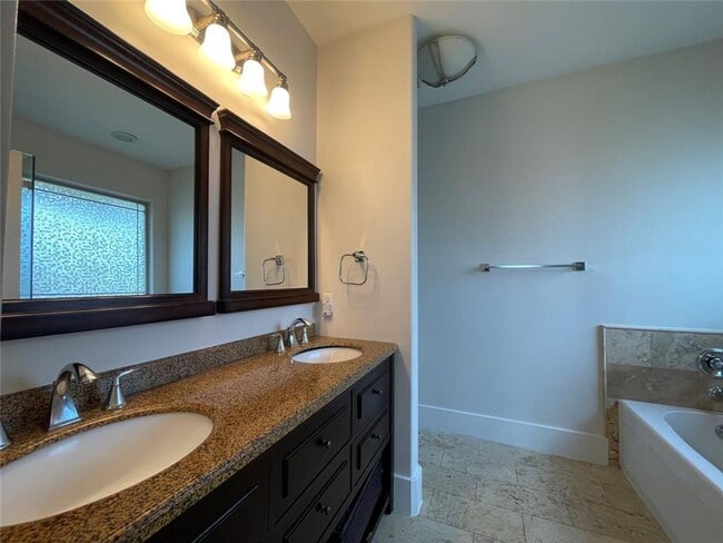 Building Photo - Spacious 2-bedroom, 2.5-bath condo available!