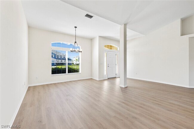 Building Photo - 4BR Home in Gated Town Lakes Community with Lake View