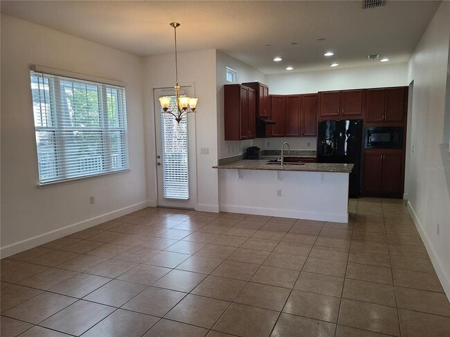 Building Photo - 13825 Benavente Ave