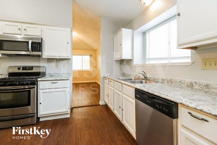 Building Photo - 6027 Woodmancote Dr