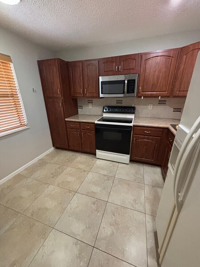 Building Photo - 8299 Boca Glades Blvd E