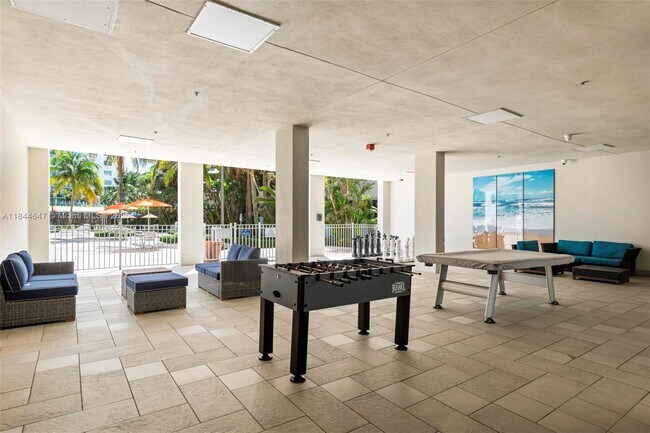 Building Photo - 19380 Collins Ave
