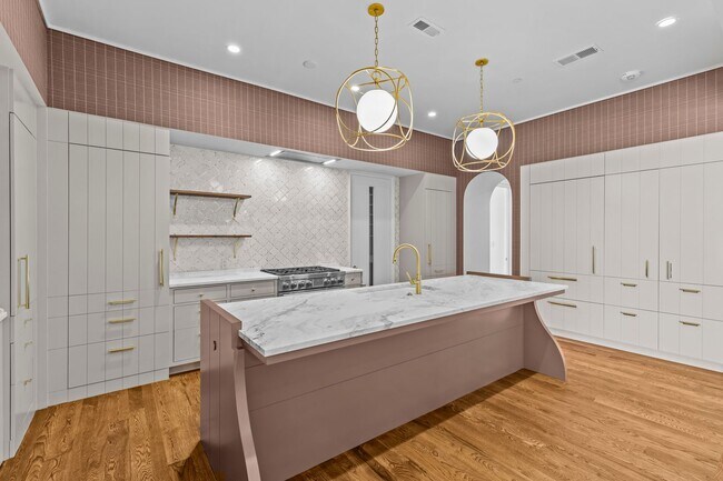 Building Photo - Rare opportunity to lease a luxury residence in The Nolen on Queens Road