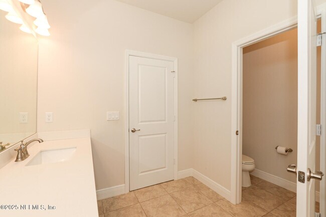 Building Photo - 10976 SW Tessili Wy