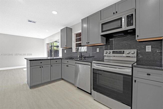 Building Photo - 10065 NW 54th Terrace