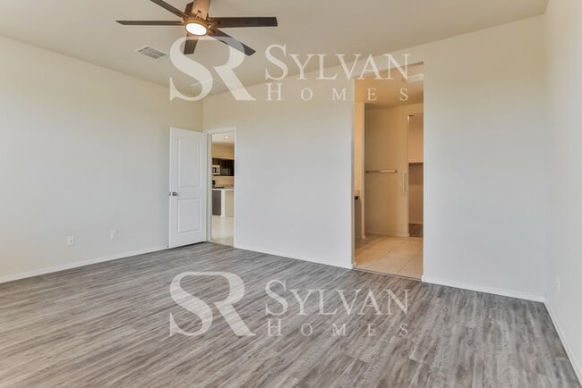 Building Photo - This charming home is ready for your personal touch!