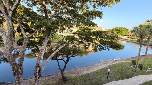 Building Photo - 6090 N Sabal Palm Blvd