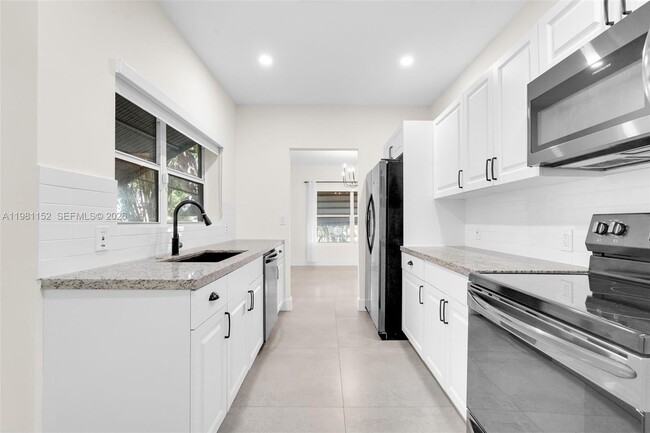 Building Photo - 52 NW 47th Terrace