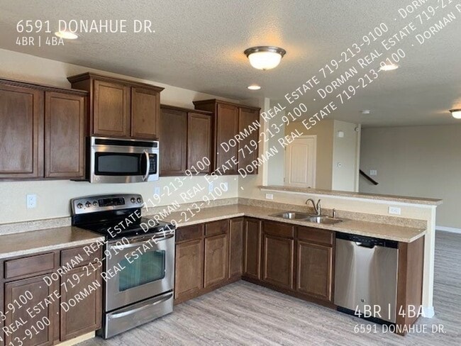 Building Photo - 6591 Donahue Drive