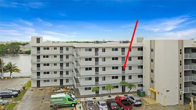 Building Photo - 9917 W Okeechobee Rd
