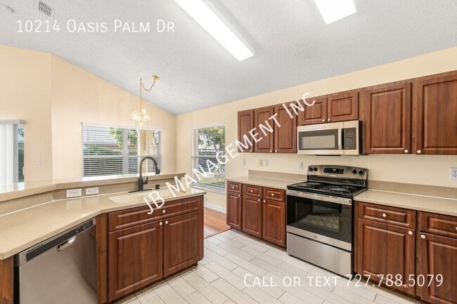 Building Photo - 10214 Oasis Palm Dr