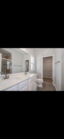 Primary Bed w/ Bath & Walk-in Closet - 458 W Tremont Ave