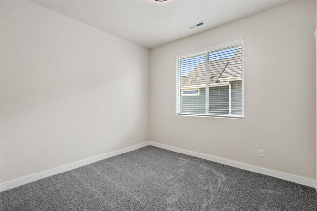 Building Photo - Brand New, Stylish 4-Bedroom Home with Vaulted Ceilings and Private Patio