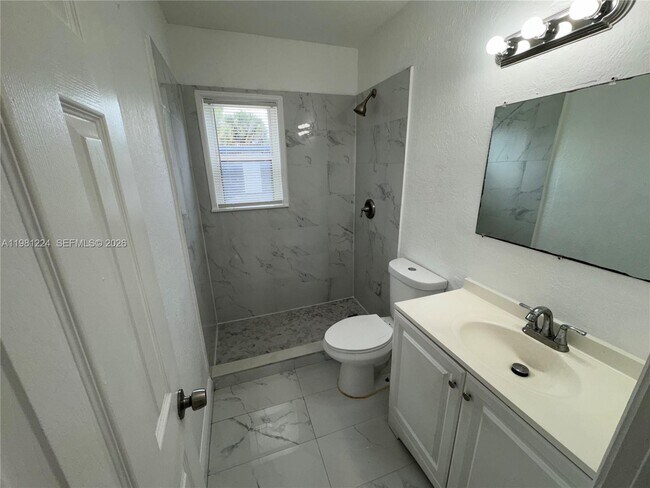 Building Photo - 1025 NW 7th Ave