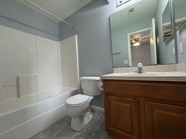 Building Photo - Available Now! Westside Timothy's Landing 2/2.5 Townhome with a 1-Car Garage