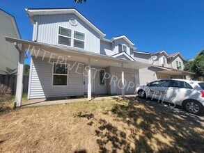 Building Photo - *1ST MONTH'S RENT FREE PROMO* 4 Bedroom Home Near Brentwood Park w/Garage, Fenced Yard & Gas Fire...