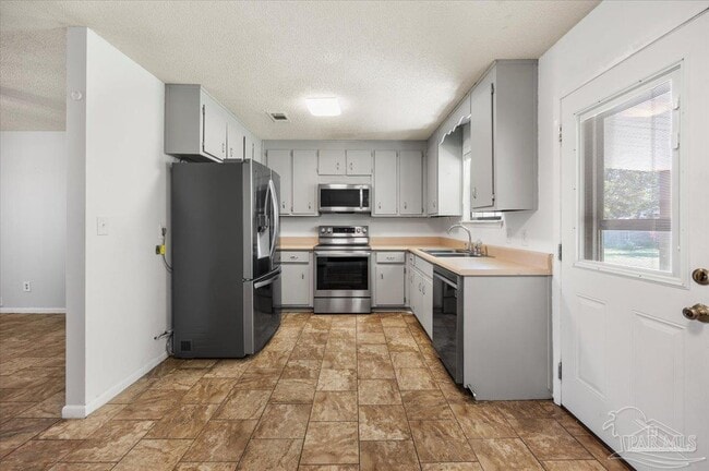 Building Photo - 5135 Nekole Dr