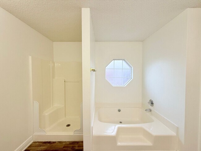 Building Photo - Spacious 4-Bedroom, All-Brick Home