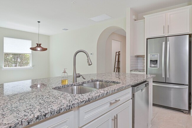 Building Photo - NOW AVAILABLE - 2/2 Plus Den Single Family Home in the Heart of Estero!