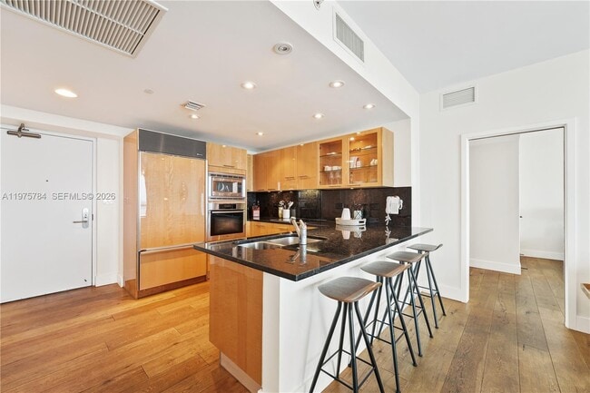 Building Photo - 6799 Collins Ave