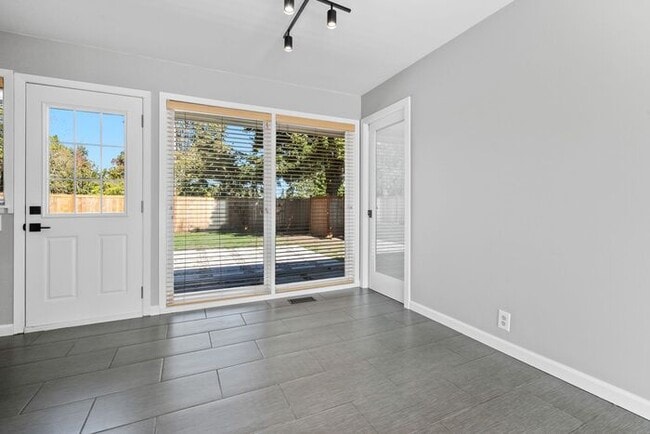 Building Photo - Freshly Updated West Seattle Rambler w/ Ai...