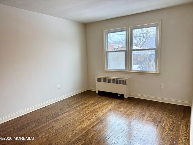 Building Photo - 320 8th Ave