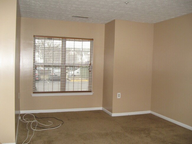 Ist Bedroom w/ Integrated Bath - 8941 Town Center Cir