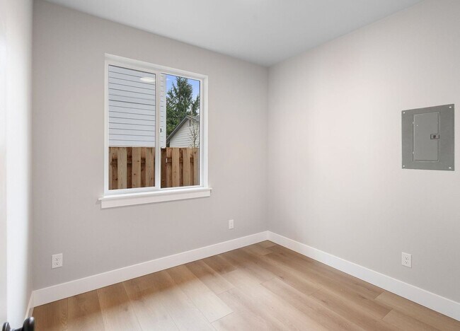 Building Photo - Brand-New Detached 2 Bedroom Home with Private Fenced Yard and Designer Finishes