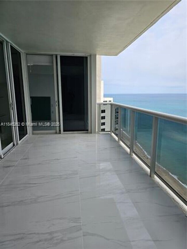Building Photo - 19111 Collins Ave