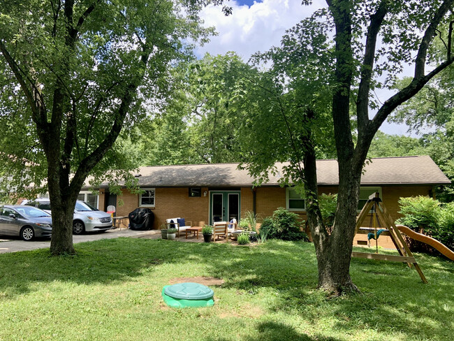 Parking for 4 cars, patio and planted bed (swing set not included) - 604 Joyce Ln