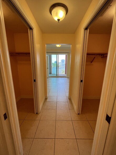 View from master bath, towards lanai/patio, looking past double walk-in closets - 2743 1st St