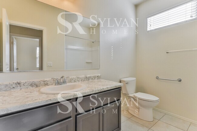 Building Photo - This charming home is ready for your personal touch!