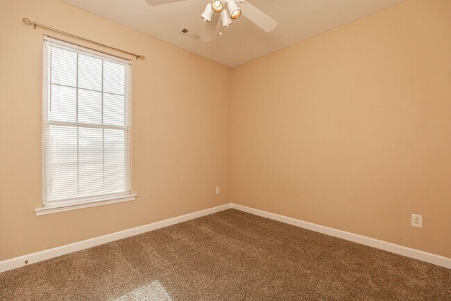 Building Photo - Located just Steps from Shopping, Dining, ...
