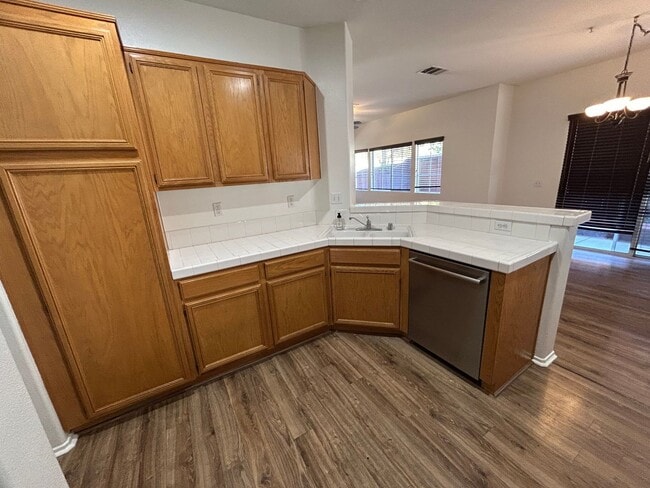 Building Photo - Cute, Clean and Cozy 3 Bedroom Condo w/Att...