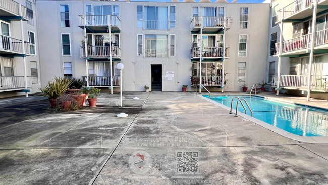 Building Photo - Chic 1-bedroom condominium located in the ...