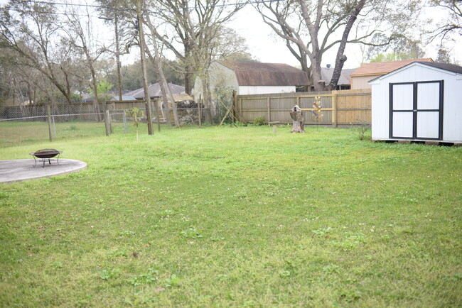 spacious backyard with storage shed. - 307 El Toro St