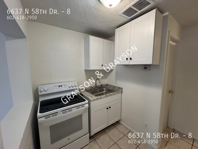 Building Photo - 6637 N 58th Dr