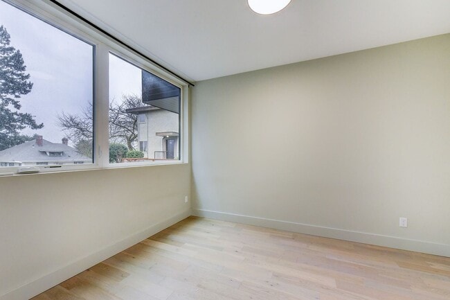 Building Photo - Smart Layout, Prime Location, and a Rooftop That Seals the Deal