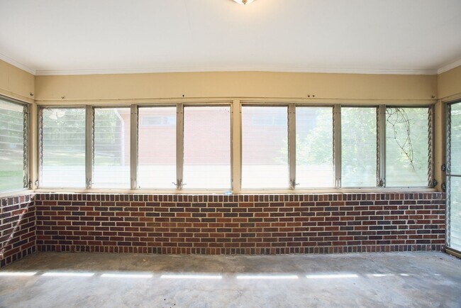 Building Photo - Vintage Charm with Modern Upgrades and Sunroom Living