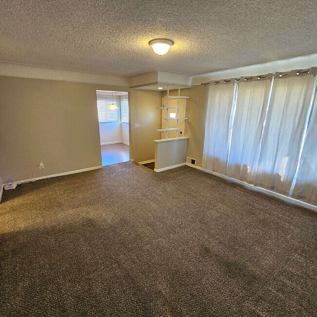 Building Photo - 3 Bedroom, 1.5 Bath Brick Ranch with Attached 2.5 Car Garage. Huge Great Room and Living Room. Bi...