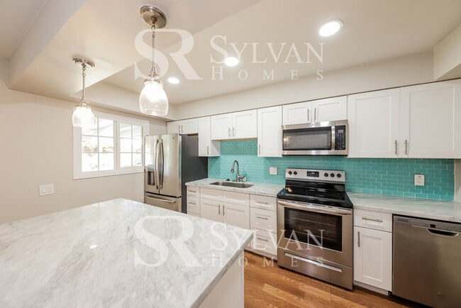 Building Photo - This lovely home is ready for your personal touch!