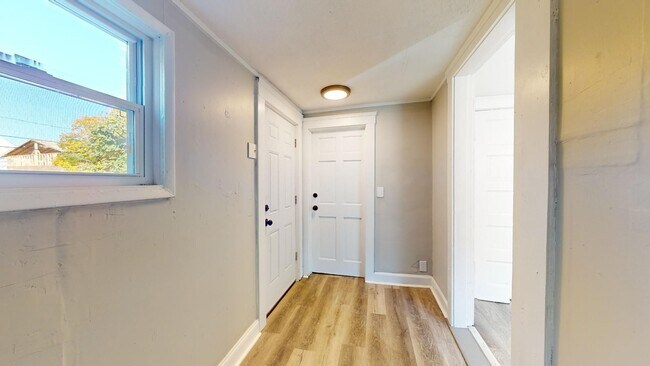 Building Photo - 7408 Dudley Ave