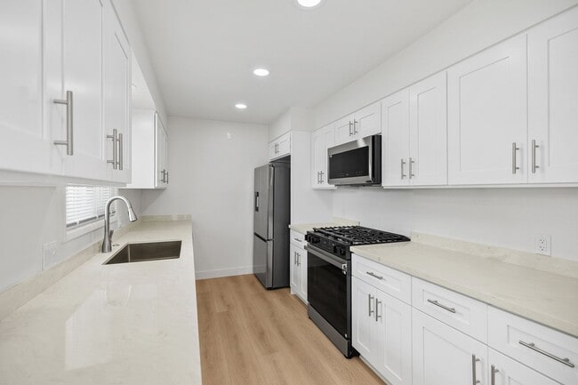 Building Photo - Coastal Living at Its Finest! Fully Remode...